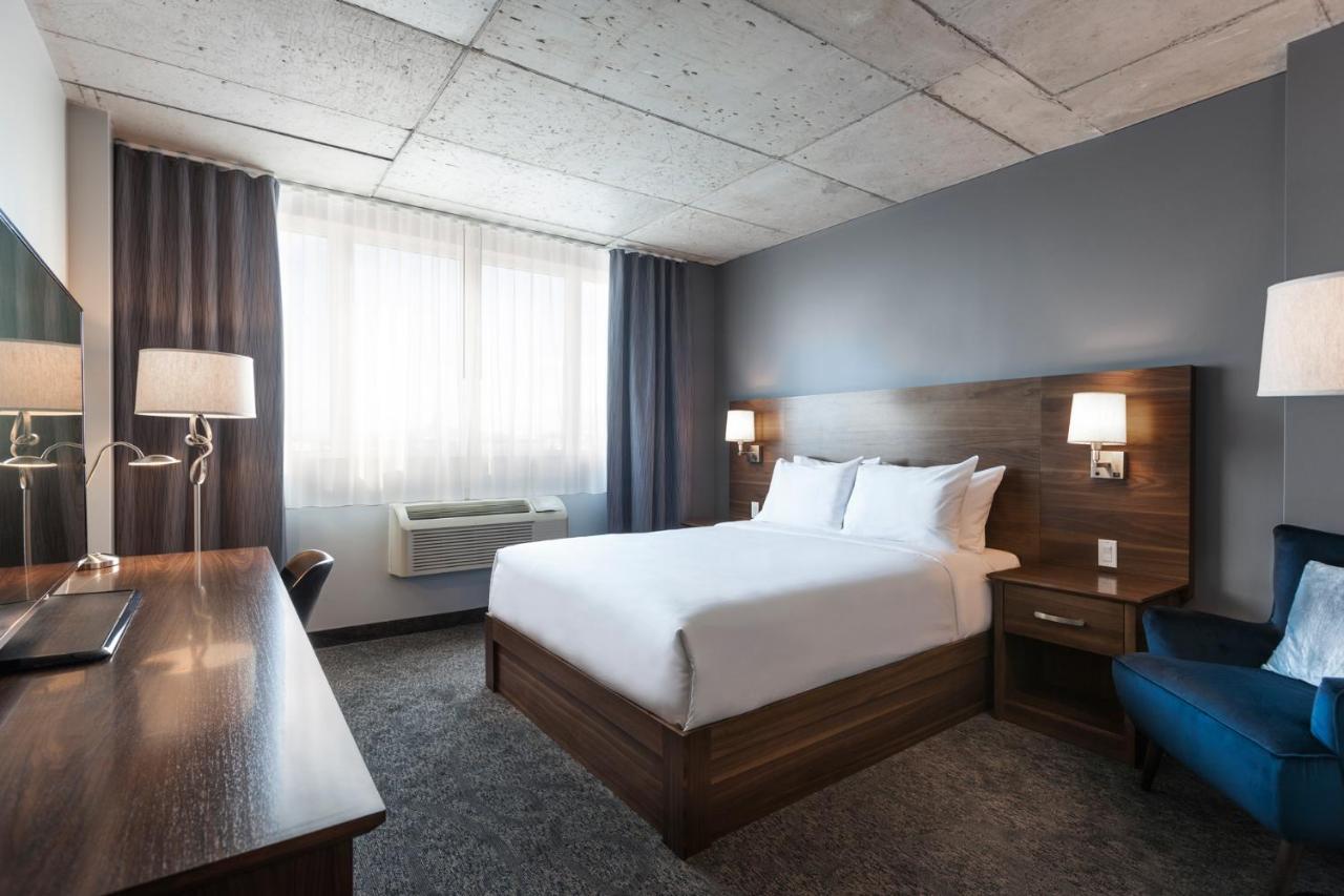 Imperia Hotel Et Suites Бушервиль Экстерьер фото