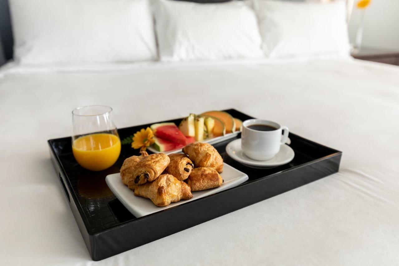 Imperia Hotel Et Suites Бушервиль Экстерьер фото